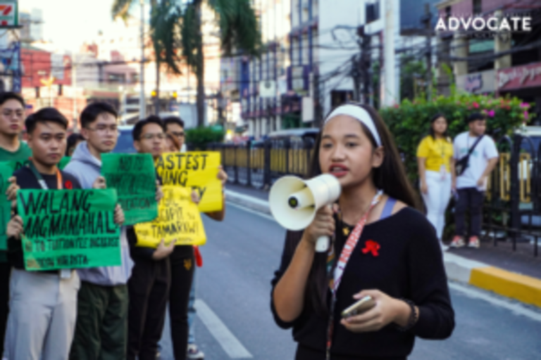 Protesting student-leaders don red ribbon amid tuition increase